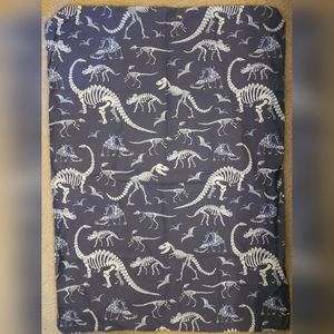 Pottery barn kids. Toddler glow in the dark dinosaur bedding.